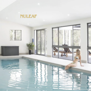 Nuleaf Retreat photo of woman relaxing at the pool with legs in the water. Relaxed destination for weddings catered by Pachamama Catering Central Coast Wedding Caterer